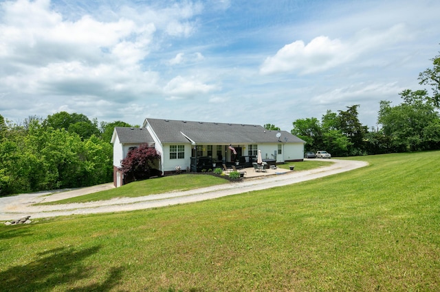 1335 Curtis Pike, Richmond, KY 40475 - single story home with a front yard, driveway, and a patio