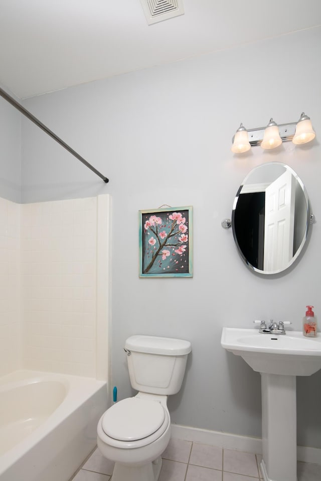 1335 Curtis Pike, Richmond, KY 40475 - full bathroom featuring tile patterned floors, toilet, baseboards, and  shower combination