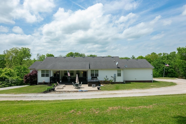 1335 Curtis Pike, Richmond, KY 40475 - rear view of property featuring a patio and a lawn