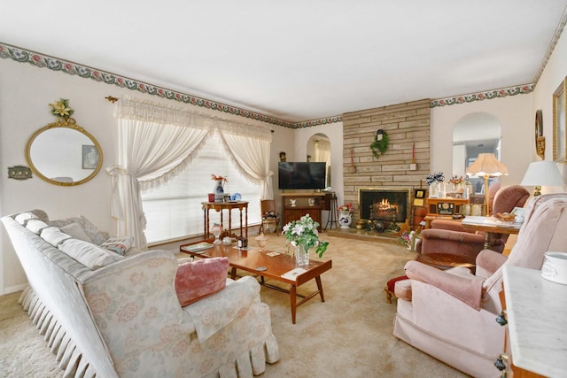 301 Vaught St, Somerset, KY 42501 - living room with carpet flooring, a stone fireplace, and arched walkways