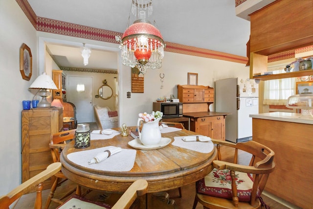 301 Vaught St, Somerset, KY 42501 - dining space with a chandelier