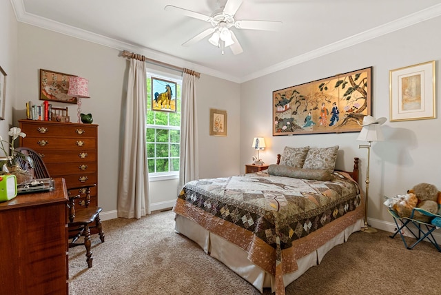 bedroom featuring light colored carpet, crown molding, baseboards, and a ceiling fan