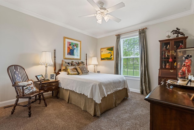 carpeted bedroom with crown molding, baseboards, and ceiling fan