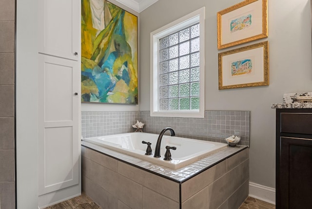 bathroom with a bath and vanity