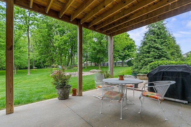 view of patio featuring grilling area and outdoor dining area