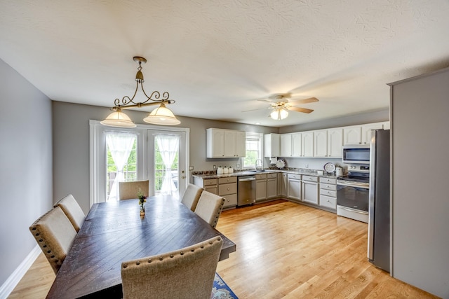 44 Gwinn Island Cir, Danville, KY 40422 - dining space with a ceiling fan and light wood-type flooring