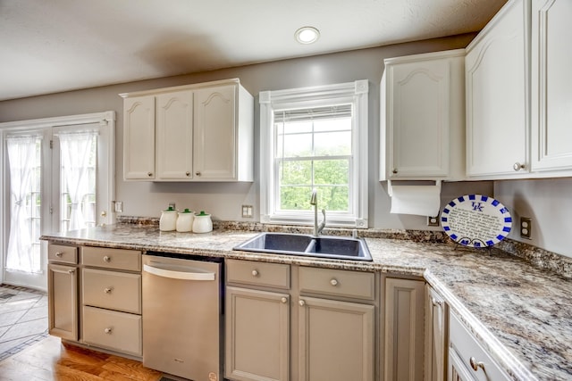 44 Gwinn Island Cir, Danville, KY 40422 - kitchen featuring dishwasher, a sink, and white cabinetry