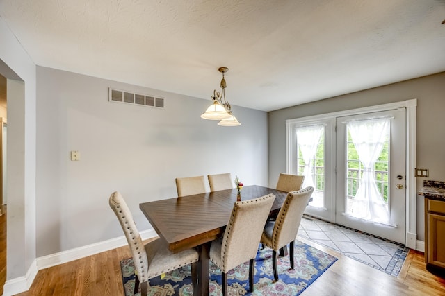 44 Gwinn Island Cir, Danville, KY 40422 - dining room featuring light wood-style flooring and baseboards