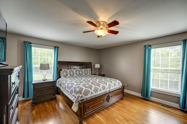 44 Gwinn Island Cir, Danville, KY 40422 - bedroom featuring baseboards, light wood-type flooring, and a ceiling fan