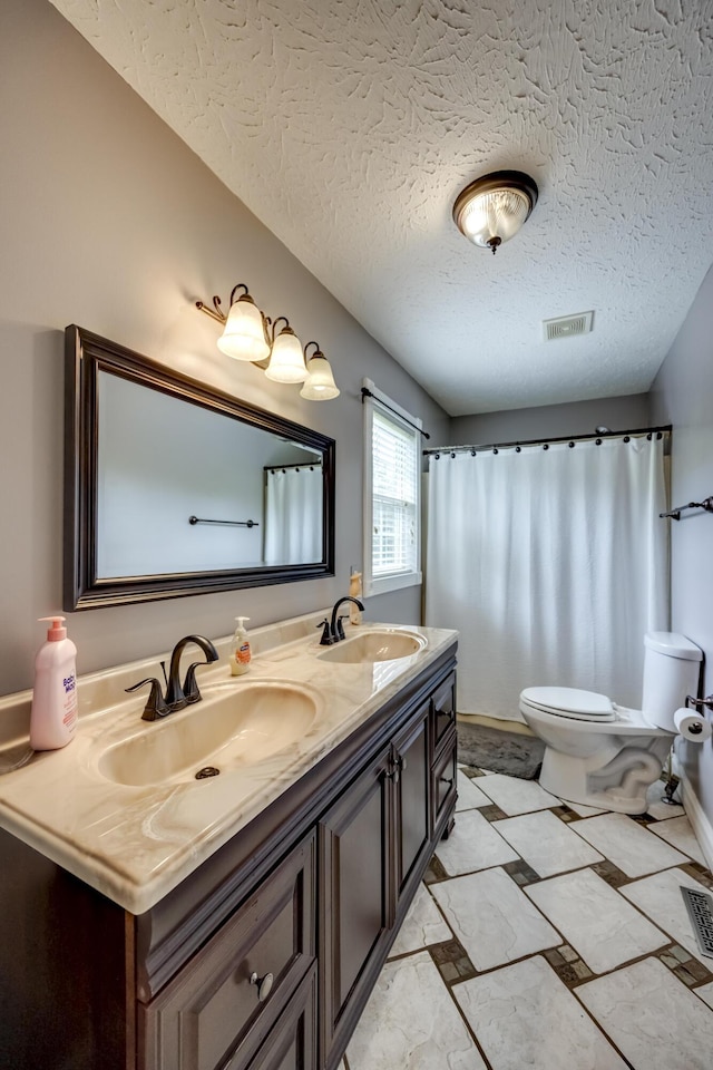 44 Gwinn Island Cir, Danville, KY 40422 - full bathroom with double vanity, toilet, a textured ceiling, and curtained shower