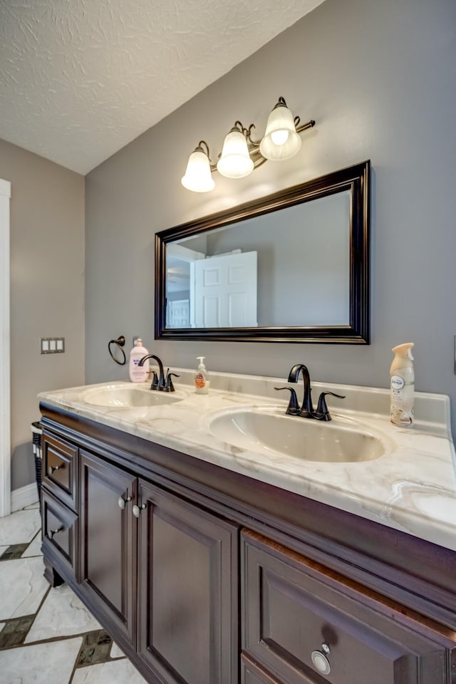 44 Gwinn Island Cir, Danville, KY 40422 - full bath with double vanity, a textured ceiling, and marble look tiles