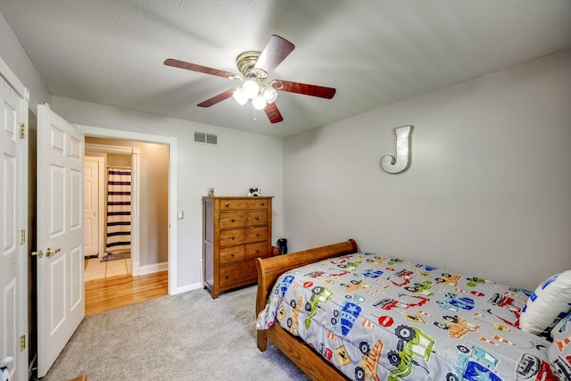 44 Gwinn Island Cir, Danville, KY 40422 - bedroom with light colored carpet and a ceiling fan