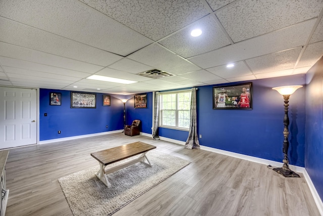44 Gwinn Island Cir, Danville, KY 40422 - living area featuring baseboards, wood finished floors, and a drop ceiling