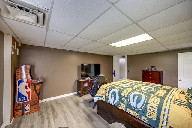 44 Gwinn Island Cir, Danville, KY 40422 - bedroom featuring a paneled ceiling, wood finished floors, and baseboards
