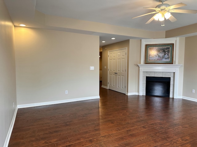 3804 Polo Club Blvd, Lexington, KY 40509 - unfurnished living room featuring dark wood finished floors, a ceiling fan, recessed lighting, baseboards, and a tile fireplace