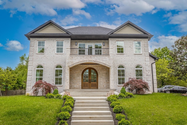 2269 Savannah Ln, Lexington, KY 40513 - view of front of house with a balcony, french doors, a porch, and brick siding