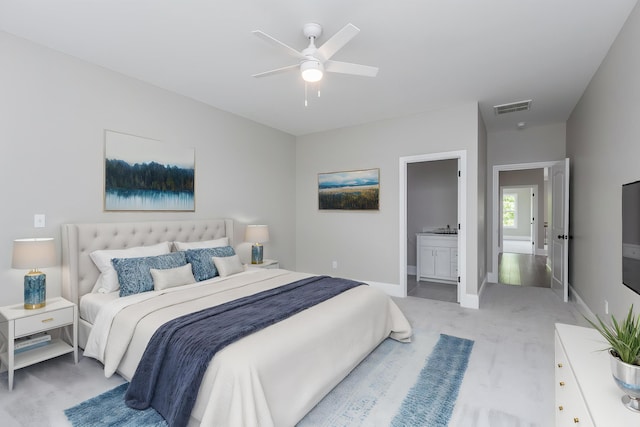 2269 Savannah Ln, Lexington, KY 40513 - bedroom featuring light carpet, baseboards, a ceiling fan, and connected bathroom