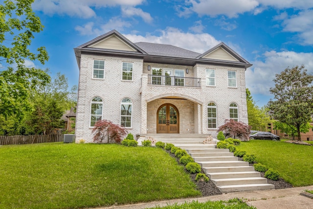 2269 Savannah Ln, Lexington, KY 40513 - view of front of property with a balcony, french doors, brick siding, central air condition unit, and stairs