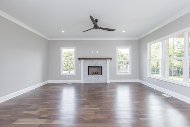 2269 Savannah Ln, Lexington, KY 40513 - unfurnished living room featuring a ceiling fan, baseboards, ornamental molding, a premium fireplace, and dark wood-type flooring