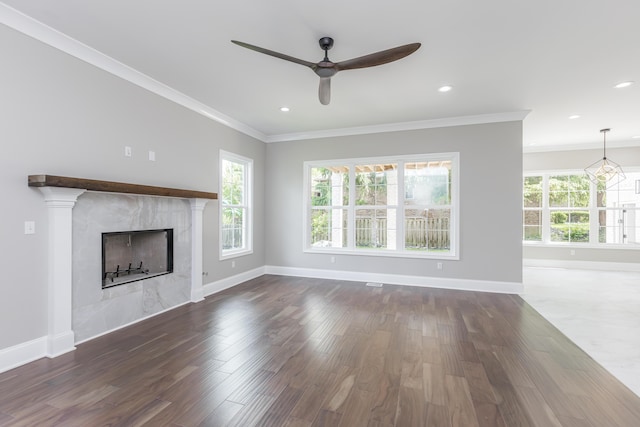 2269 Savannah Ln, Lexington, KY 40513 - unfurnished living room featuring a ceiling fan, crown molding, baseboards, dark wood-type flooring, and a fireplace