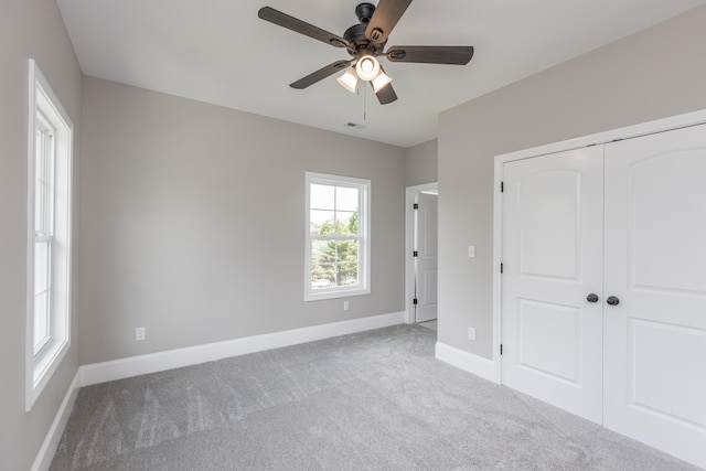 2269 Savannah Ln, Lexington, KY 40513 - unfurnished bedroom featuring carpet floors, baseboards, a closet, and ceiling fan