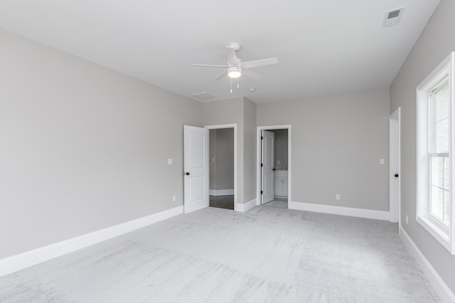 2269 Savannah Ln, Lexington, KY 40513 - unfurnished bedroom with light colored carpet, baseboards, and ceiling fan