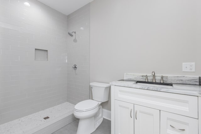 2269 Savannah Ln, Lexington, KY 40513 - full bath featuring vanity, toilet, tiled shower, and tile patterned flooring