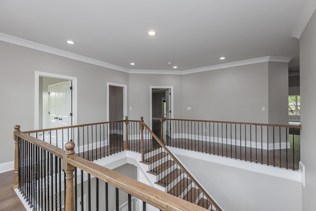 2269 Savannah Ln, Lexington, KY 40513 - hallway with an upstairs landing, recessed lighting, crown molding, wood finished floors, and baseboards