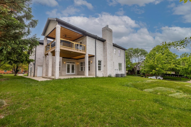 2269 Savannah Ln, Lexington, KY 40513 - rear view of house featuring a chimney, ceiling fan, a yard, and a patio area