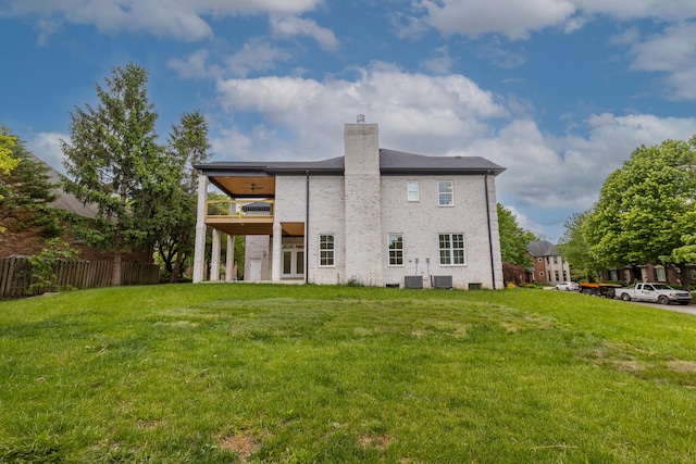 2269 Savannah Ln, Lexington, KY 40513 - rear view of house with a chimney, central air condition unit, and brick siding