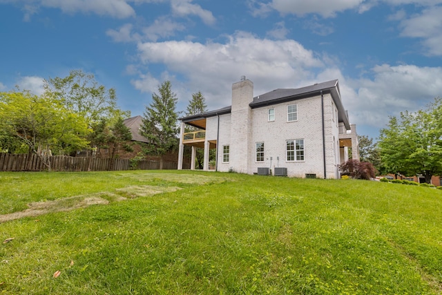 2269 Savannah Ln, Lexington, KY 40513 - back of property featuring a chimney, cooling unit, and a balcony