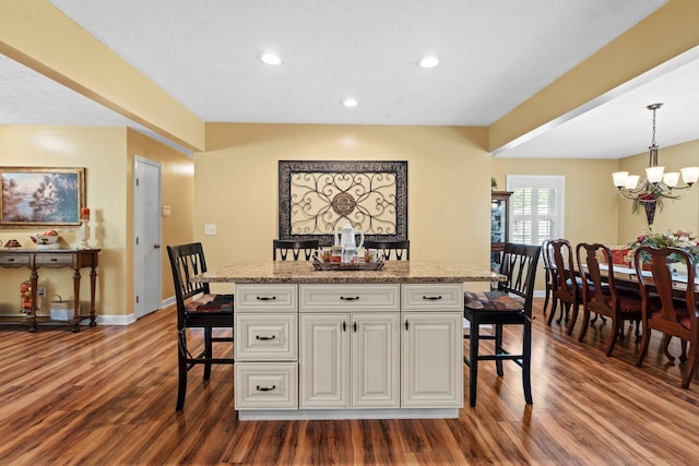256 Michael Blvd, Frankfort, KY 40601 - bar featuring baseboards, dark wood-type flooring, a chandelier, decorative light fixtures, and recessed lighting