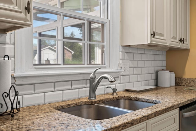 256 Michael Blvd, Frankfort, KY 40601 - kitchen featuring a sink, dishwasher, tasteful backsplash, and healthy amount of natural light