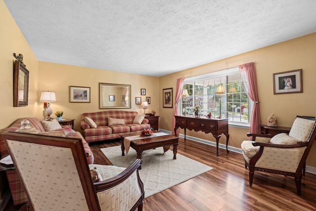 256 Michael Blvd, Frankfort, KY 40601 - living area with wood finished floors, a textured ceiling, and baseboards