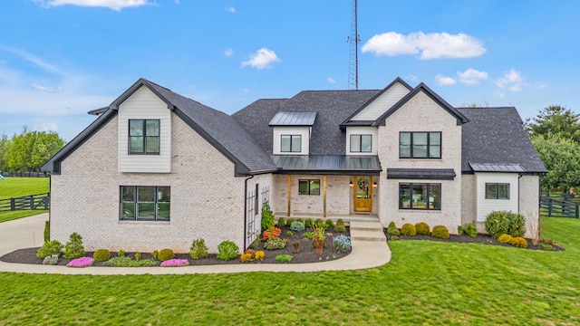 502 W Brannon Rd, Nicholasville, KY 40356 - modern inspired farmhouse with brick siding, a standing seam roof, metal roof, a porch, and roof with shingles