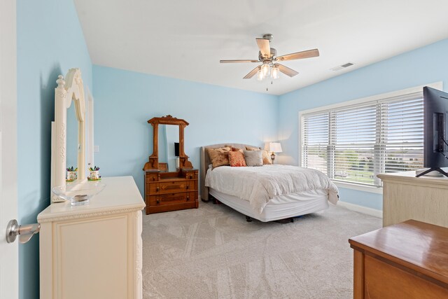 502 W Brannon Rd, Nicholasville, KY 40356 - bedroom with light colored carpet, baseboards, and a ceiling fan