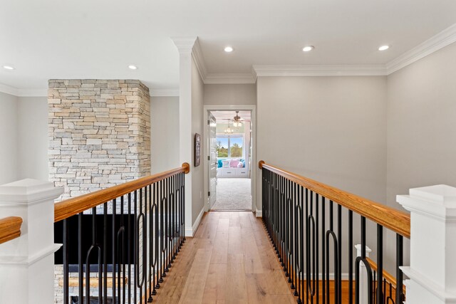 502 W Brannon Rd, Nicholasville, KY 40356 - hallway with light wood-style floors, an upstairs landing, recessed lighting, ornamental molding, and baseboards