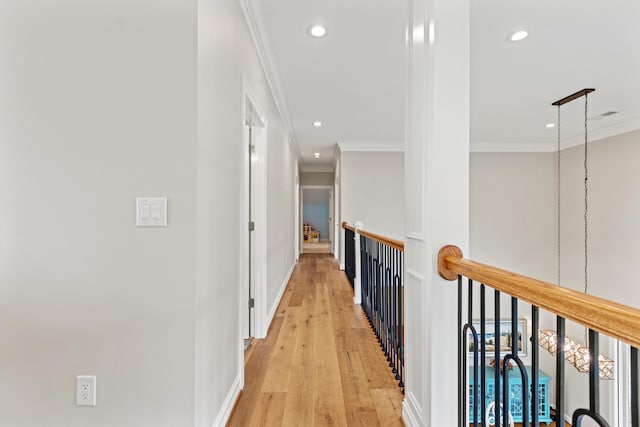 502 W Brannon Rd, Nicholasville, KY 40356 - corridor with crown molding, recessed lighting, light wood-style floors, an upstairs landing, and baseboards