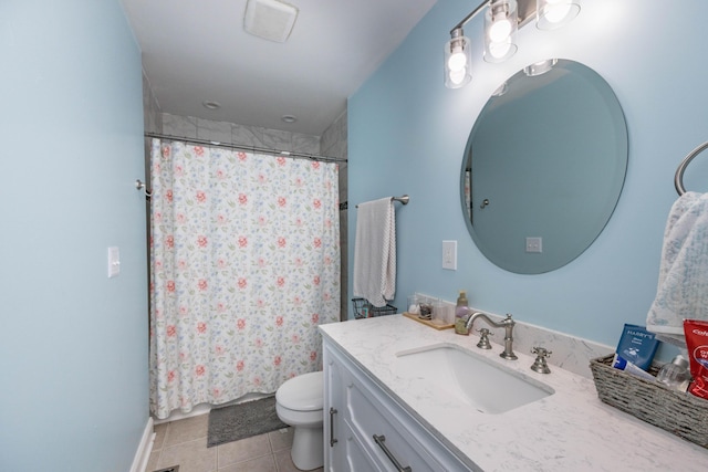full bathroom featuring tile patterned floors, toilet, vanity, and a shower with curtain