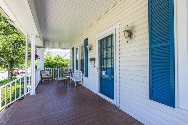 deck featuring covered porch