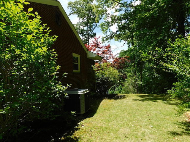 184 Meadow Dr, Harlan, KY 40831 - view of green lawn with central AC unit