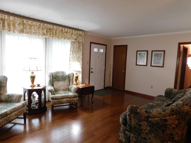 184 Meadow Dr, Harlan, KY 40831 - living room featuring hardwood / wood-style floors, ornamental molding, and baseboards