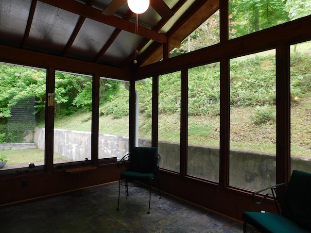 184 Meadow Dr, Harlan, KY 40831 - sunroom featuring vaulted ceiling, plenty of natural light, a ceiling fan, and stone finish flooring