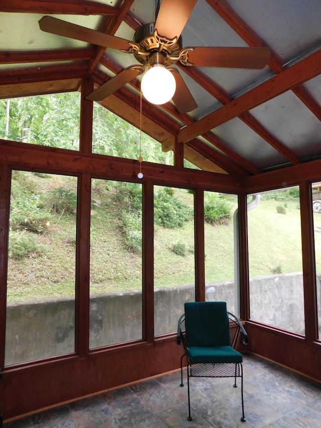 184 Meadow Dr, Harlan, KY 40831 - sunroom / solarium featuring vaulted ceiling, healthy amount of natural light, stone finish floors, and a ceiling fan