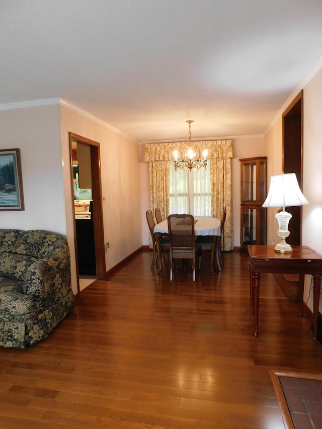 184 Meadow Dr, Harlan, KY 40831 - dining area featuring a chandelier, wood finished floors, and ornamental molding