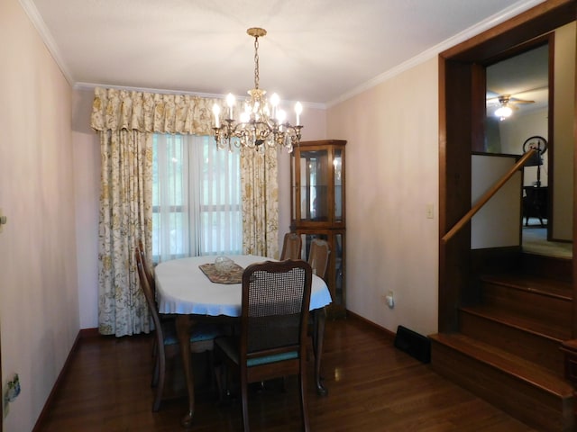 184 Meadow Dr, Harlan, KY 40831 - dining space featuring baseboards, a chandelier, wood finished floors, crown molding, and stairway