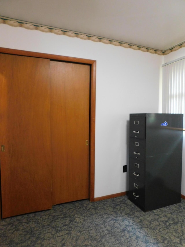 184 Meadow Dr, Harlan, KY 40831 - carpeted bedroom featuring a closet and baseboards