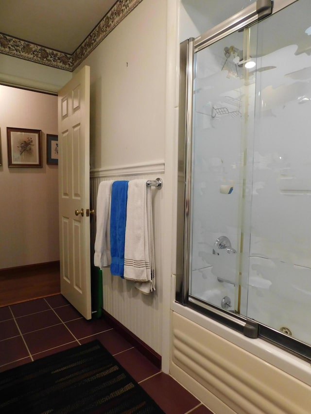 184 Meadow Dr, Harlan, KY 40831 - full bath with tile patterned flooring, shower / bath combination with glass door, and baseboards