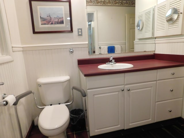 184 Meadow Dr, Harlan, KY 40831 - half bathroom with wainscoting, toilet, and vanity