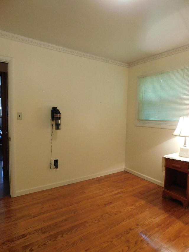 184 Meadow Dr, Harlan, KY 40831 - spare room featuring wood finished floors and baseboards